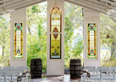 Empty chapel image showing the stained glass detail.